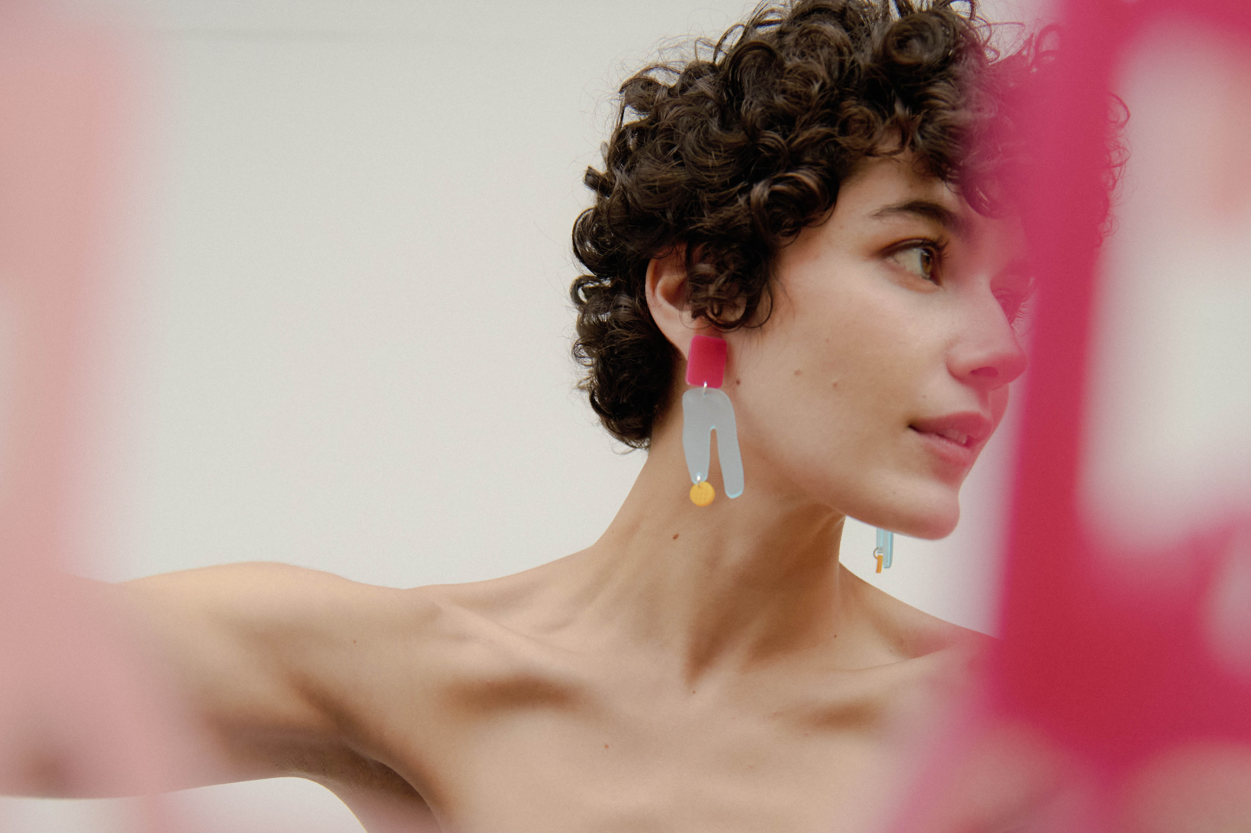 model wearing lasercut jewelry by Capulet and Montague